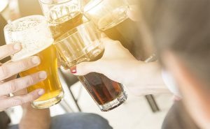 people drinking different beers