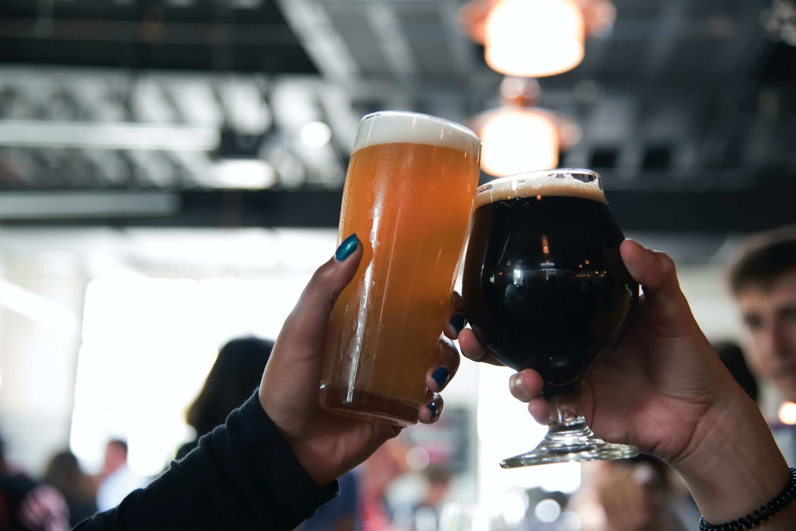 two people drinking beer